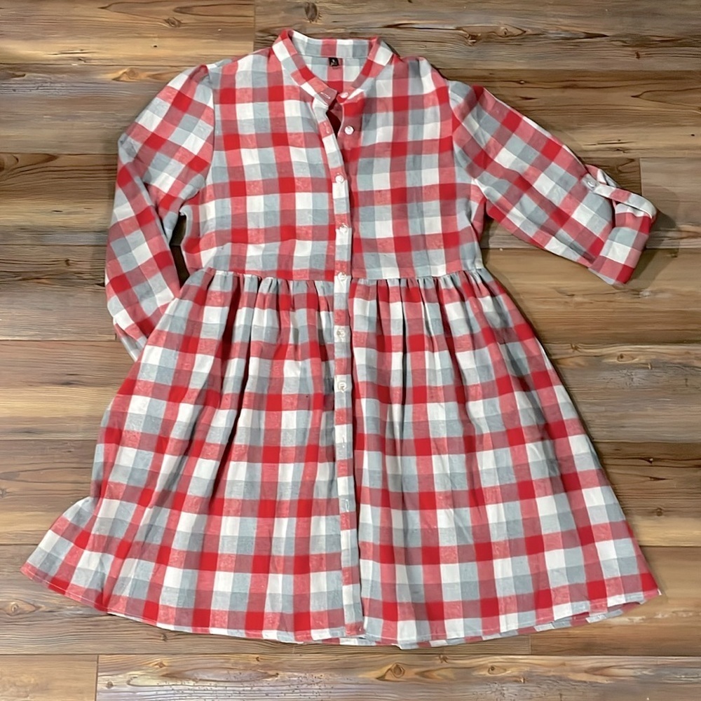 Women’s Plaid Flannel Button Up Pleated Dress with Pockets and roll up sleeves.